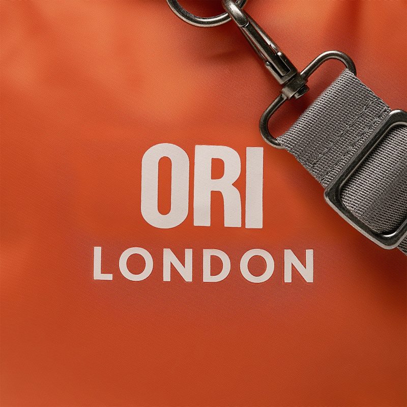 ORI Luton BurntOrange Cream Logo